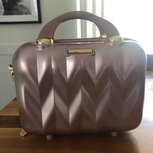 Marcy McKenna makeup luggage case pink